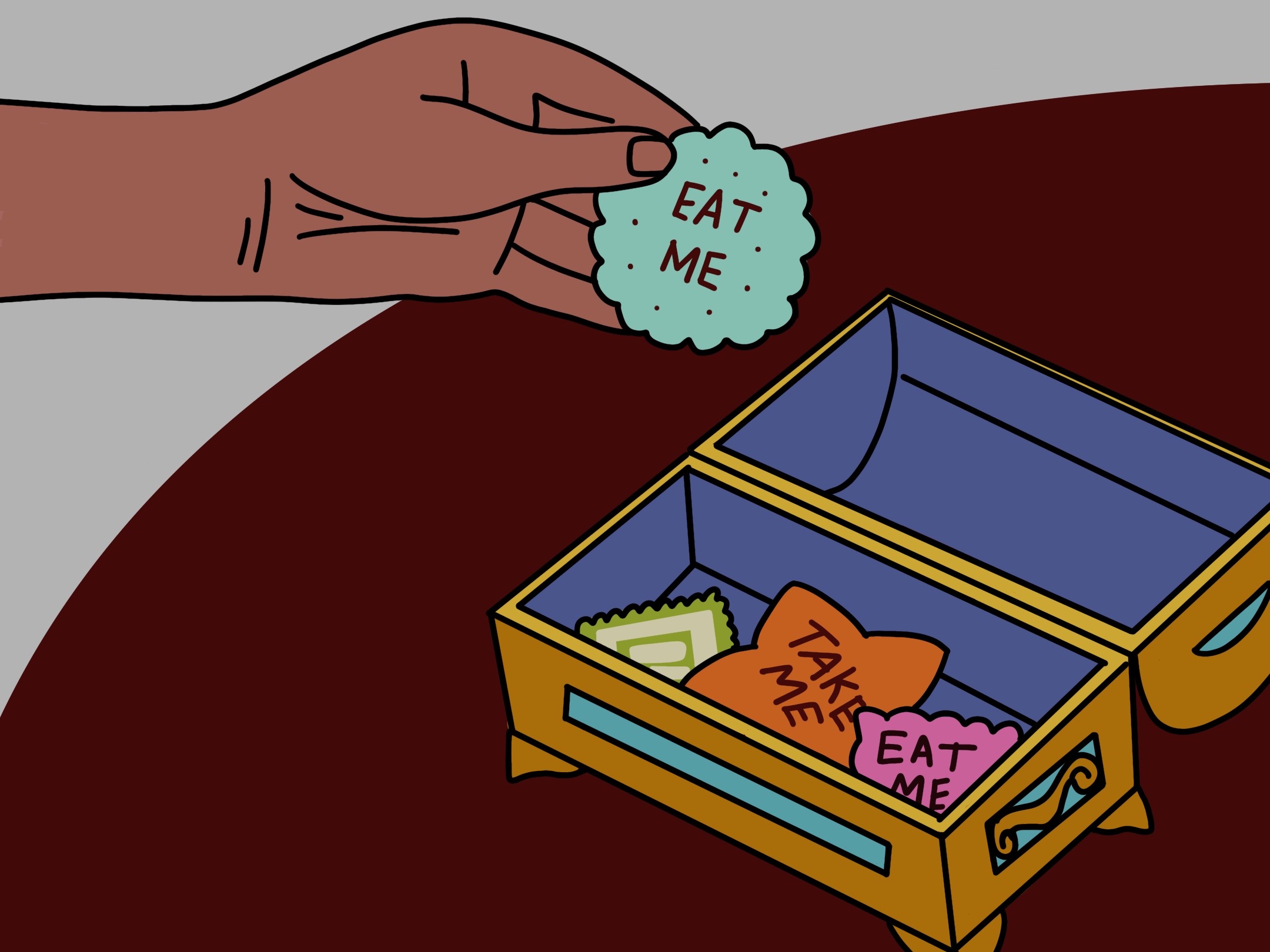 A hand is reaching into a box with three biscuits inside - it is holding a light blue biscuit with the words Eat Me